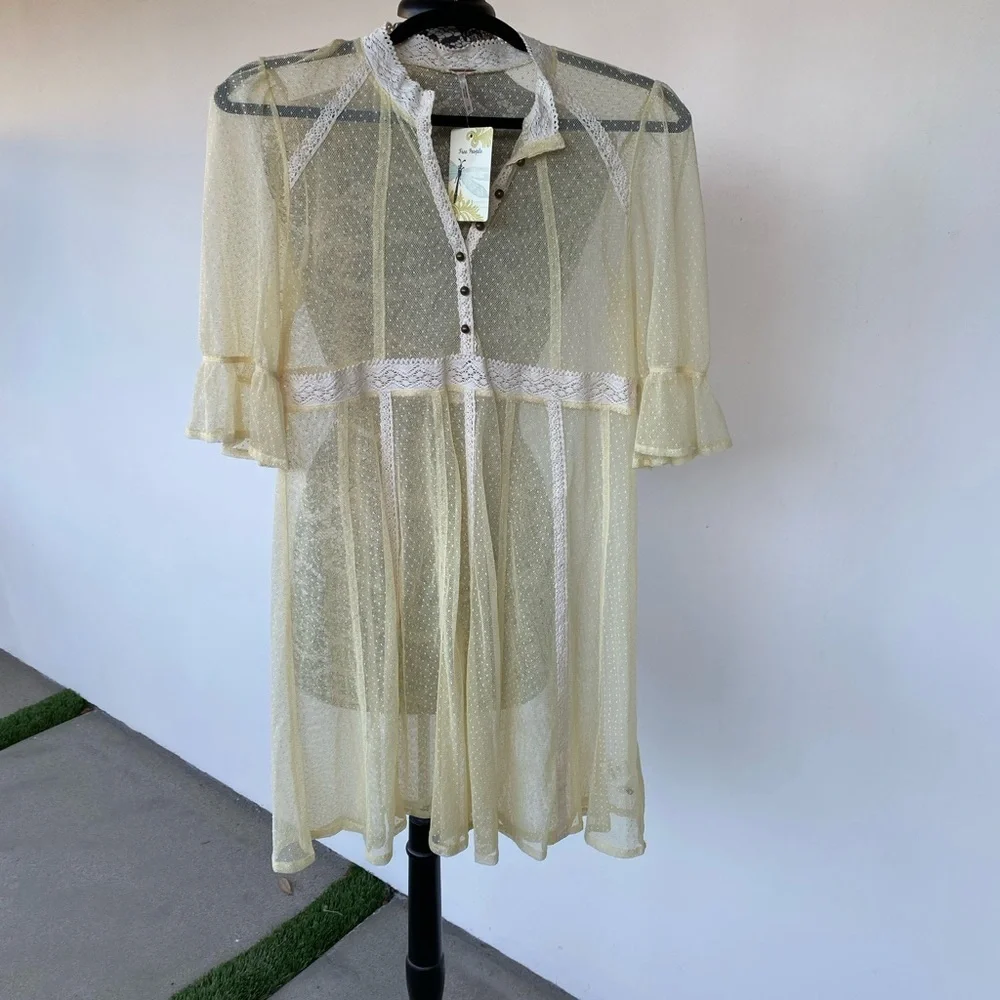 Elegant Cream Lace Dress by Free People size medium.